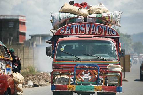 SATISFACTION : une publicité pour célébrer la naissance d’Haïti Monde ! - © Flickr - Alex E. Proimos